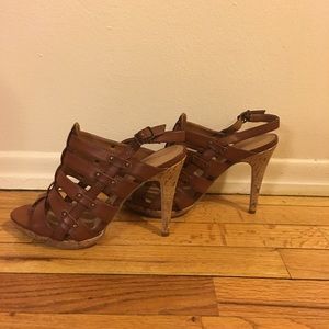 Brown high heels by Delicious